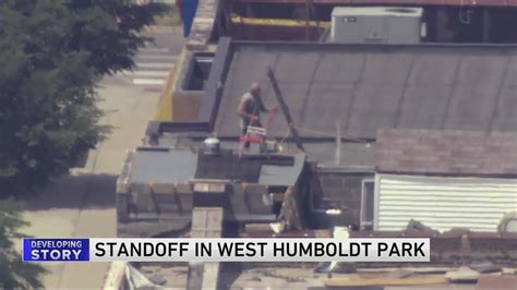 SWAT responds to man on rooftop of Humboldt Park building